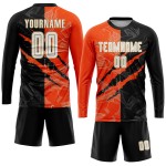 Custom Sublimation Fußball Schwarz Jersey Orange-Altes Muster Gold Weiß Scratch Graffiti Uniform Custom Sublimation Fußball Schwarz Jersey Orange-Altes Muster Gold Weiß Scratch Graffiti Uniform